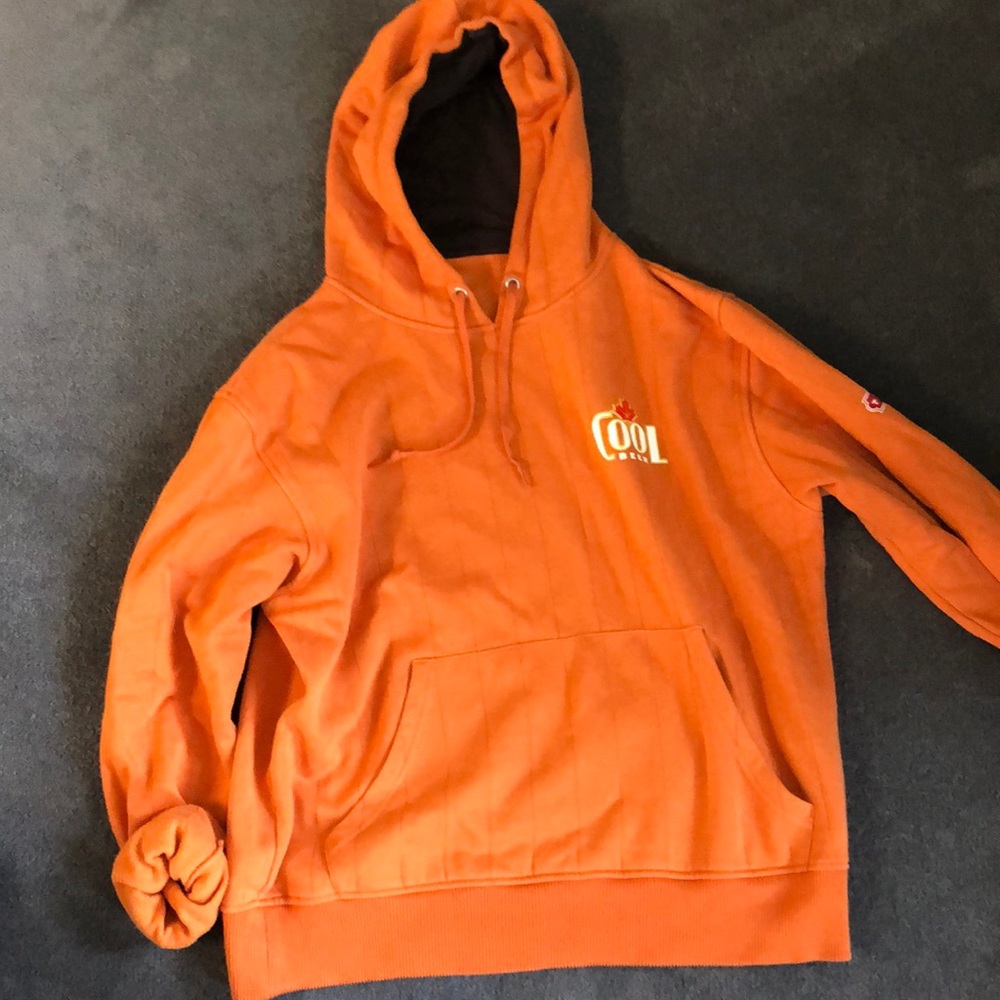 Oversized “cool beer” sweater